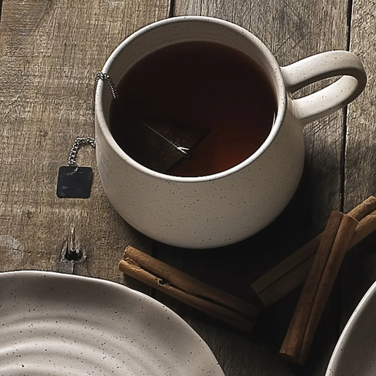 Ecology Ottawa Mug in calico stoneware with dimpled texture, perfect for coffee or tea