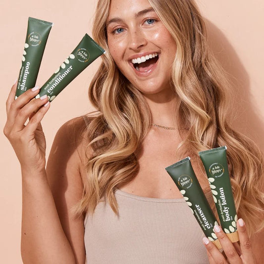 A Bit Hippy Mini Essentials travel set with shampoo, conditioner, cleanser, and body lotion