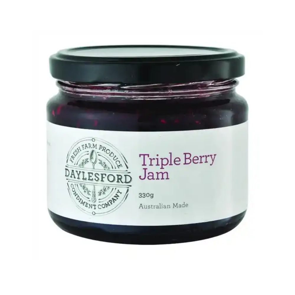 Daylesford Condiment Co. triple berry jam 330g in a round glass jar with a black lid and white label, showing the dark berry jam inside