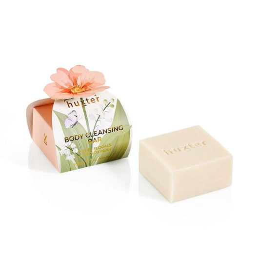 Huxt er White Florals & French Pear body cleansing bar 150g with floral botanical packaging and embossed soap block, Australian made luxury soap.