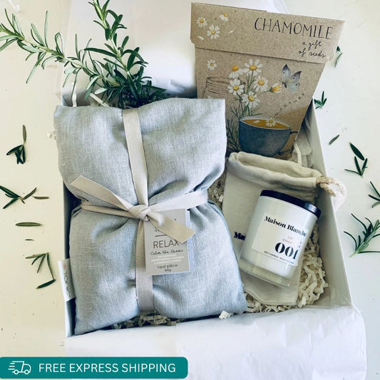 A beautiful Care box to gift to any one too far away for a hug, including a soothing heat pillow, Sow N Sow seeds and a Beautifully fragranced mini candle from Maison Blanche with your personalized message wrapped in our gift box By Wishing You Well