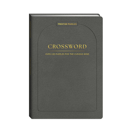 Prestige Crossword Puzzle Book in charcoal grey with gold lettering – over 130 puzzles