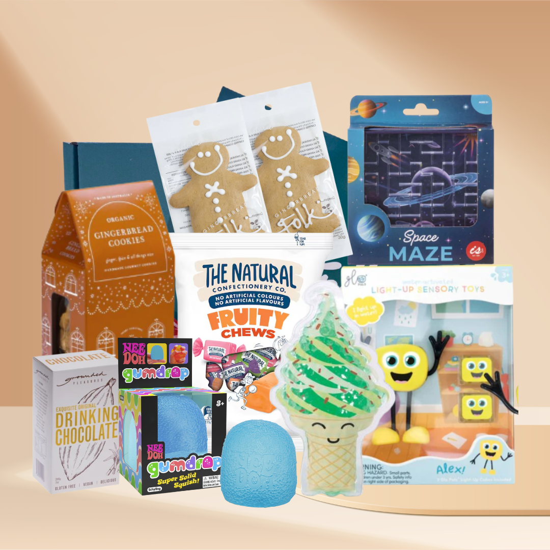 Kids gift hamper with cookie, maze game, sensory squishy and light-up bath toy arranged in a gift box