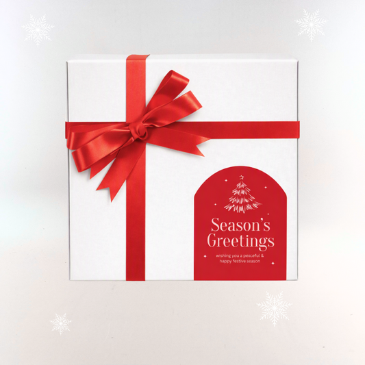 White Gift Box with Red Ribbon and Christmas Sticker