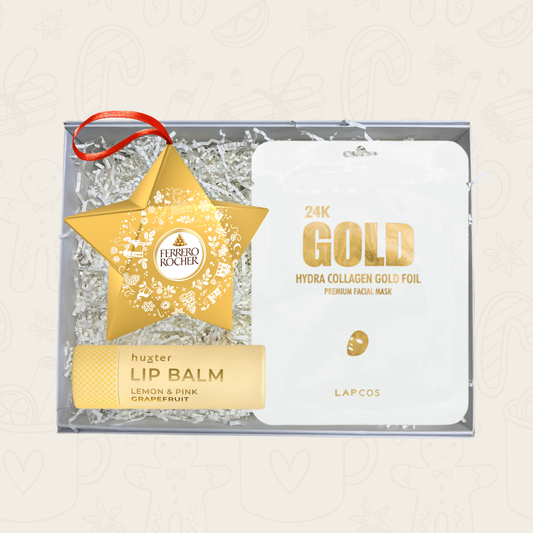 You’re So Golden gift box with Lapcos gold face mask, Ferrero Rocher star trio and Huxter lip balm.