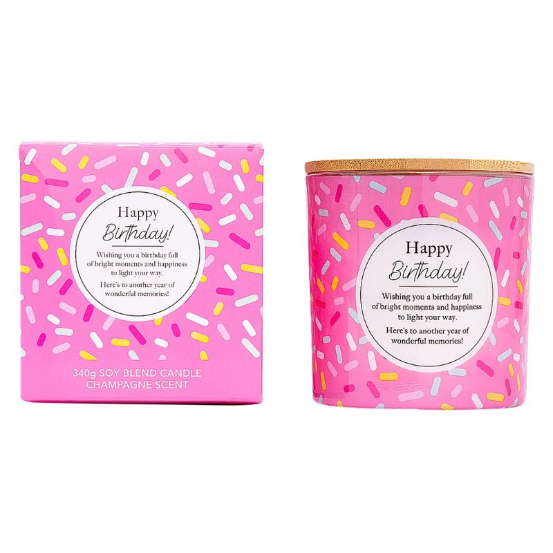 Pink Happy Birthday soy candle with champagne scent in a glass jar and matching gift box featuring a colorful confetti design