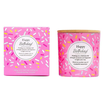 Pink Happy Birthday soy candle with champagne scent in a glass jar and matching gift box featuring a colorful confetti design