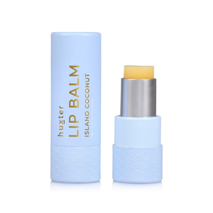 Huxter Island Coconut Lip Balm in a wind-up tube, natural vegan lip care enriched with Vitamin E, jojoba oil, and avocado oil.