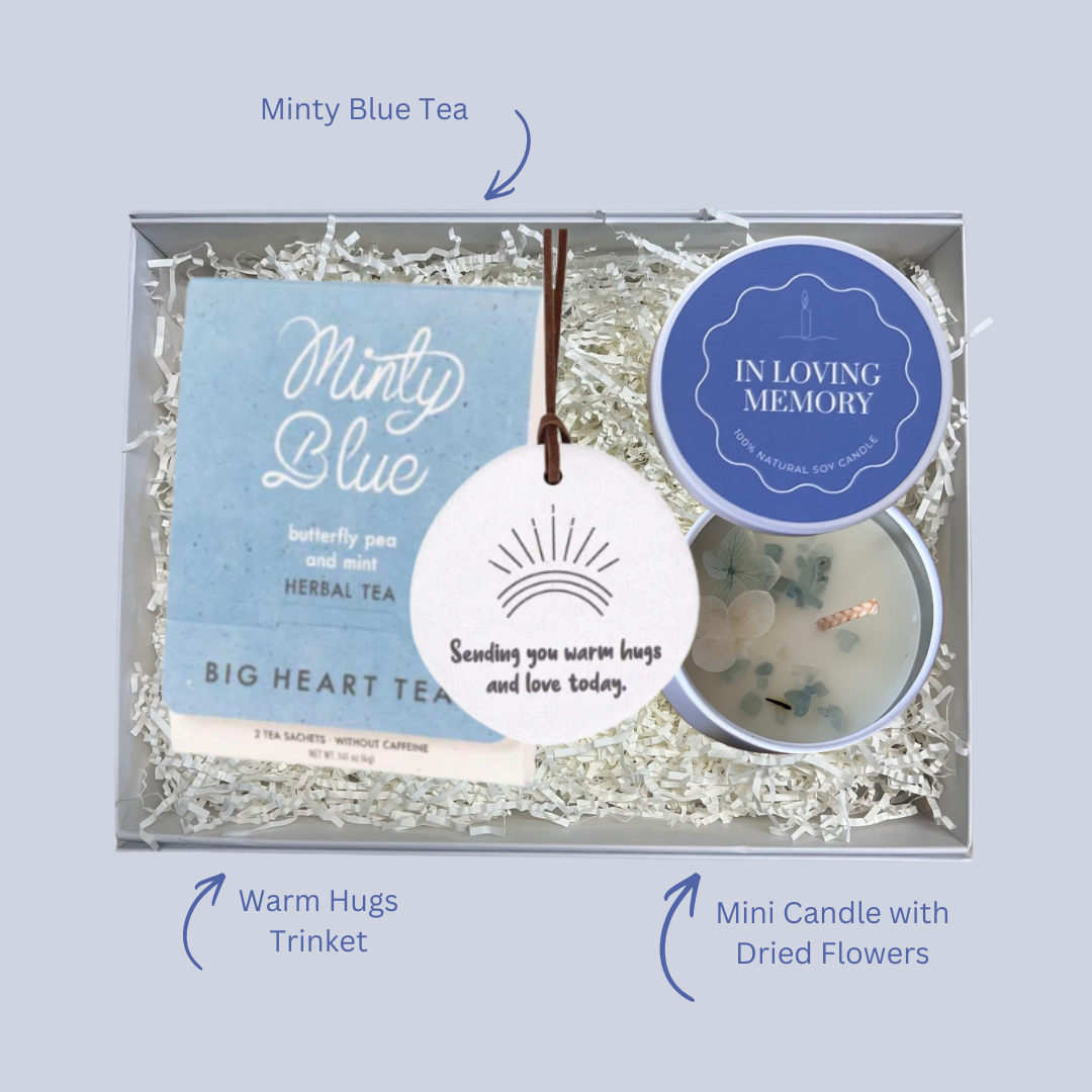 In Loving Memory Gift Box with blue dried flower memorial candle, Big Heart Co minty blue tea for two and sending warm hugs engraved trinket. With labels