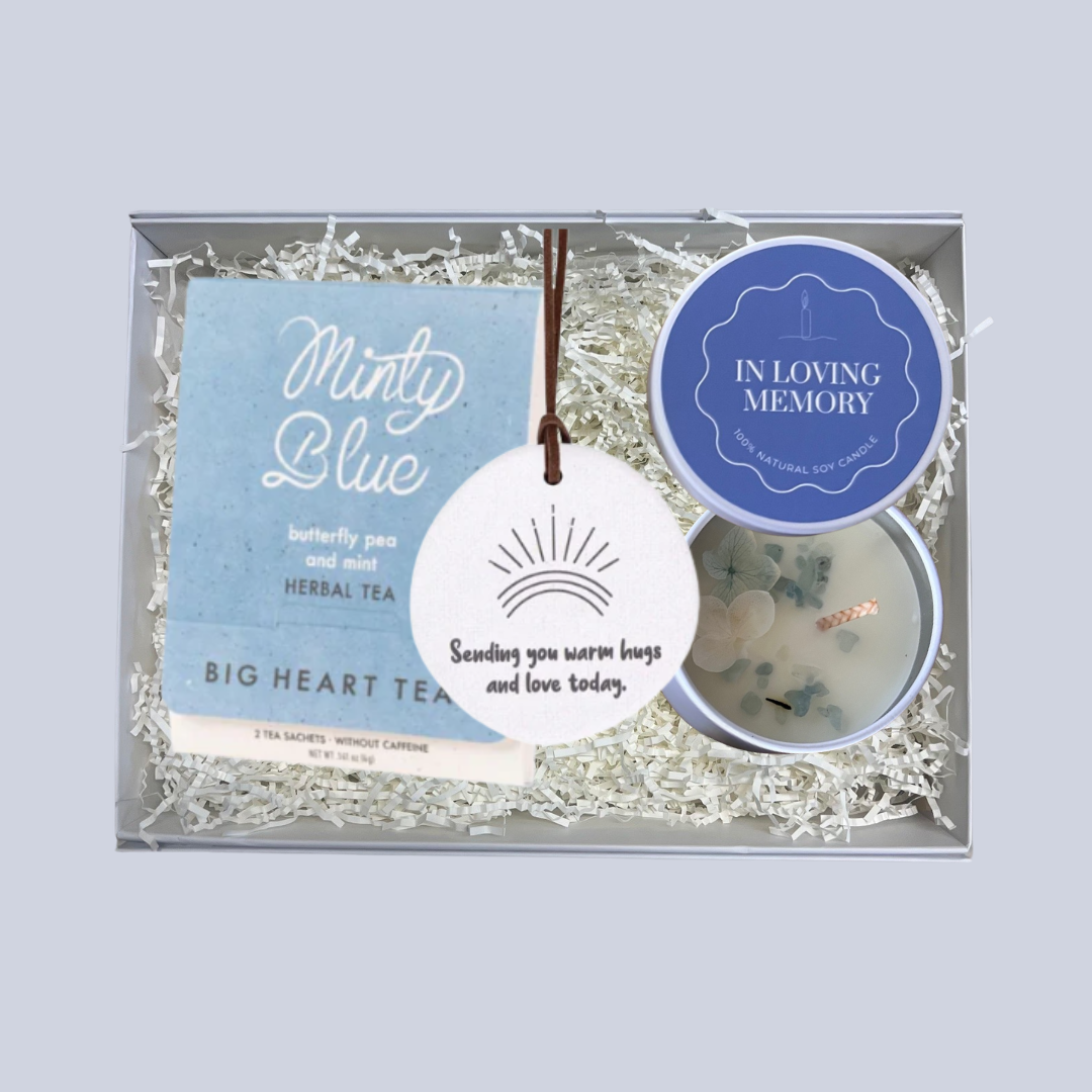 In Loving Memory Gift Box with blue dried flower memorial candle, Big Heart Co minty blue tea for two and sending warm hugs engraved trinket