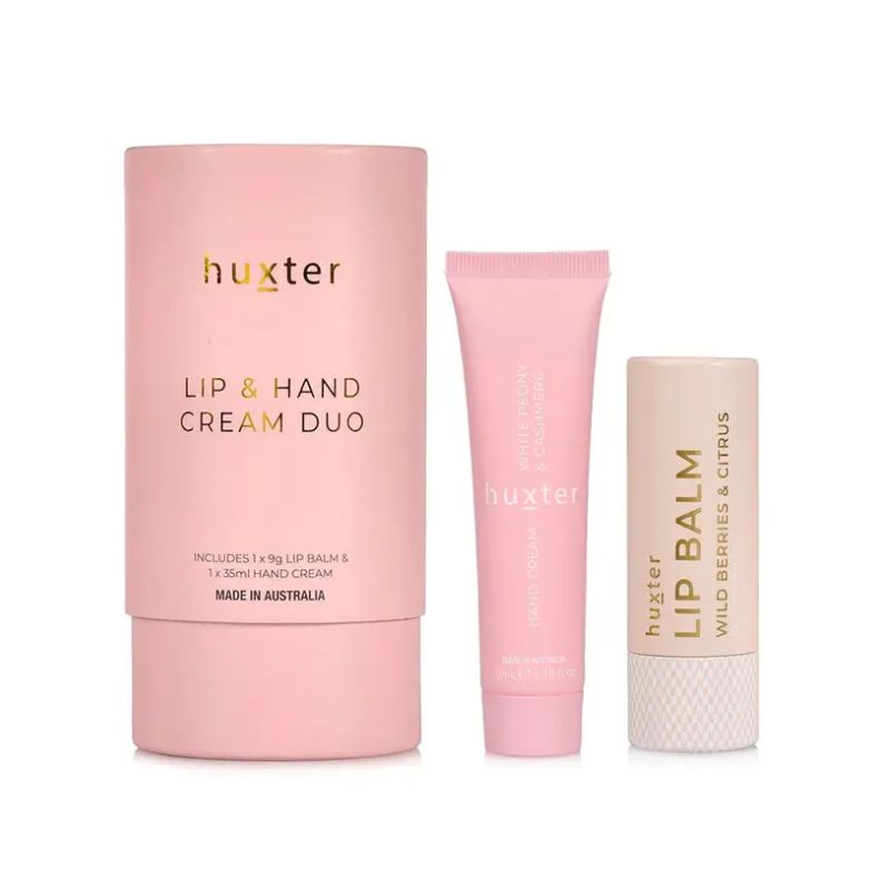 Huxt er Lip & Hand Cream Duo gift set including White Peony hand cream and Wild Berries lip balm in blush pink packaging with gold detailing.