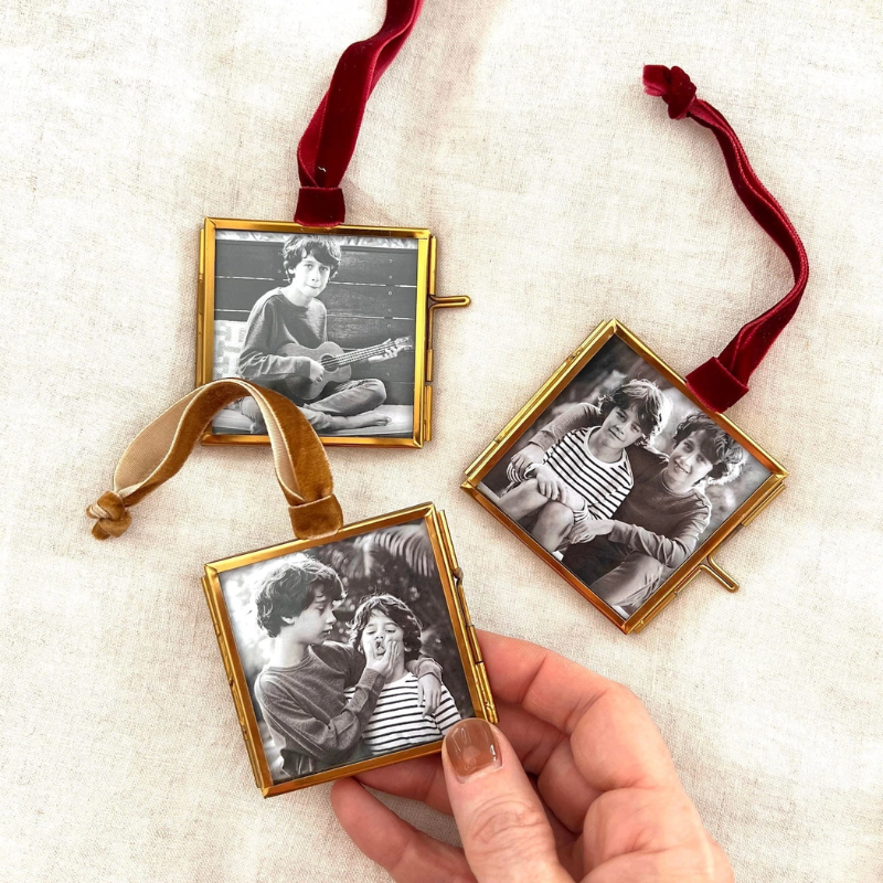 Mini frame Christmas tree ornament with ribbon for hanging.