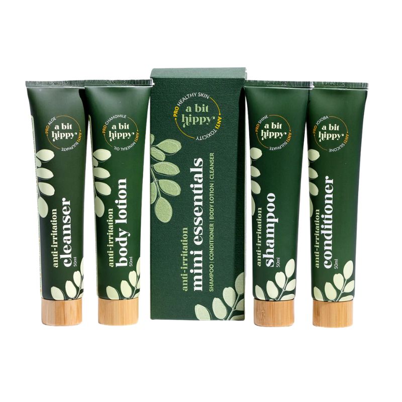 A Bit Hippy Mini Essentials travel set with shampoo, conditioner, cleanser, and body lotion