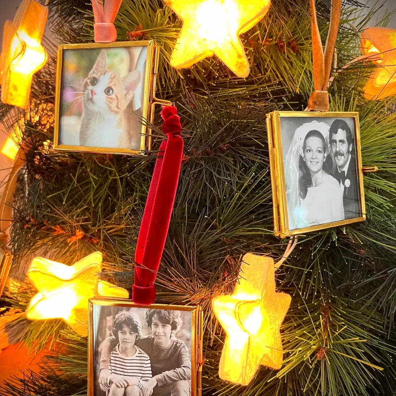 Mini frame Christmas tree ornament with ribbon for hanging.