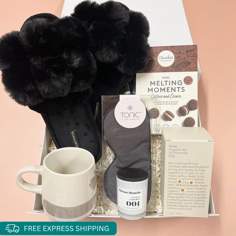 This perfect gift includes a whole experience, slide your tooties into these soft luxurious pom pom slippers, Use the ecology mug to make yourself a cup of organic sleep tea by Love Tea, apply a generous amount of the sleep essential oil to your temple and behind the ears to support a restful sleep then cover those gorgeous eyes with a lavender eye pillow all packaged and wrapped in a gift box by Wishing You Well