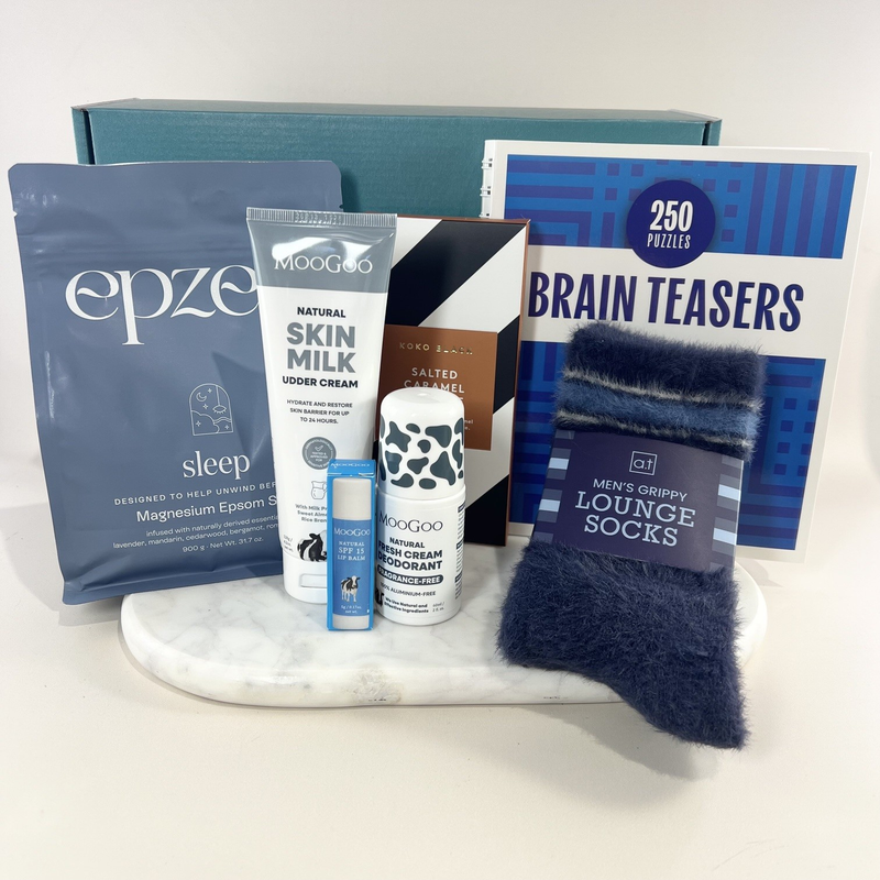 Get well gift box for men with Epzen bath salts, MooGoo skincare, Koko Black chocolate, brain teaser book and navy grippy socks
