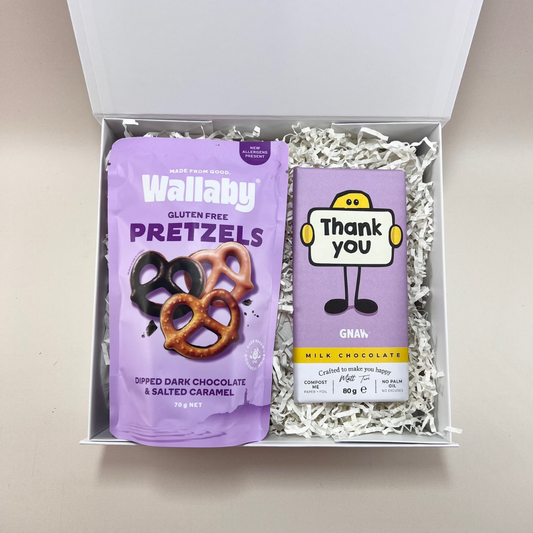 The Sweet Thanks Gift Box with Gnaw thank you milk chocolate bar and Wallaby Foods chocolate pretzels, presented in a signature gift box