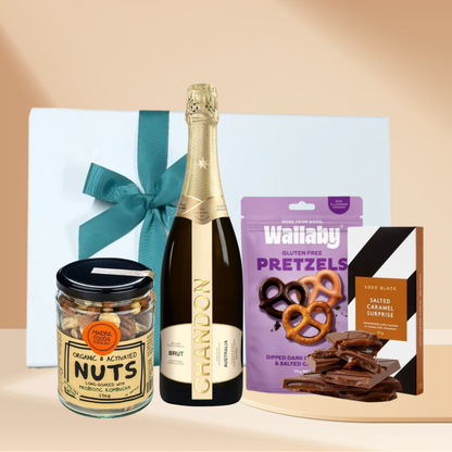 The Cheers Gift Hamper with Chandon Brut sparkling wine, salted caramel chocolate block, chocolate caramel mini pretzels and Mindful Foods organic mixed nuts