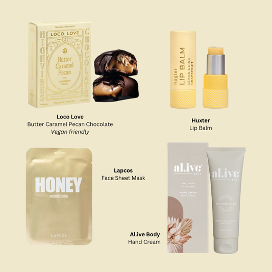 Luxury pamper gift box featuring candles, bath products, and treats from The Luxe Lounge – perfect relaxation and self-care gift.