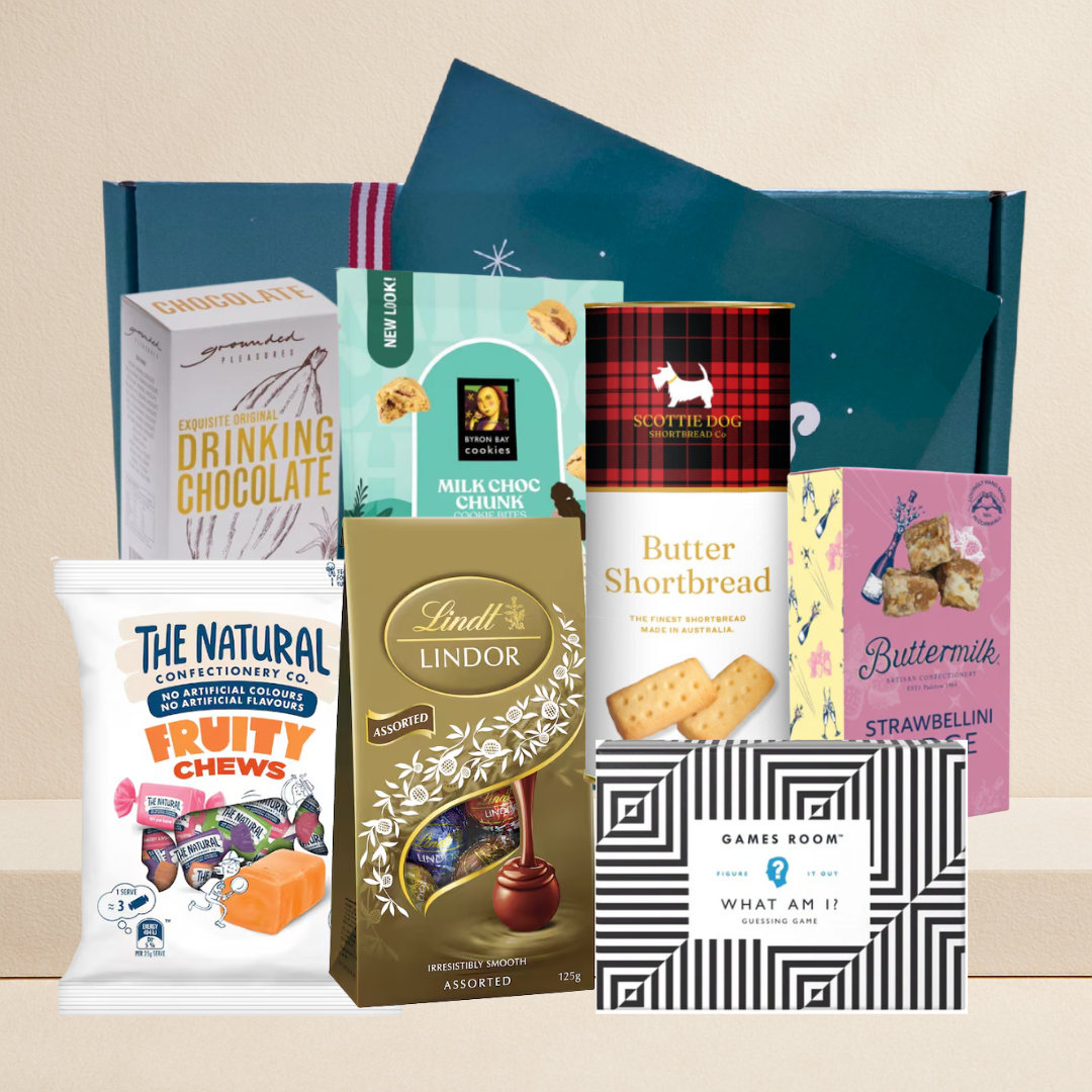 Team Appreciation Gift Hamper with chocolates, cookies, fudge, hot chocolate, fruity chews and party game in a festive gift box.