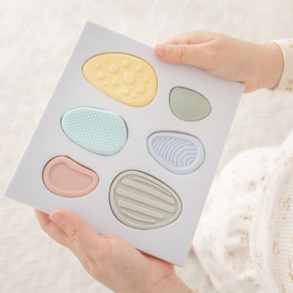 Set of 6 Worry Stones for kids — calming sensory fidget toys made from soft, food-grade silicone for mindfulness, anxiety relief, and emotional regulation.