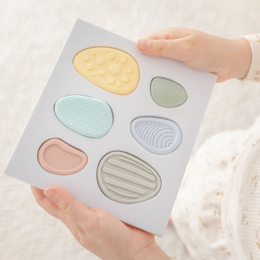 Set of 6 Worry Stones for kids — calming sensory fidget toys made from soft, food-grade silicone for mindfulness, anxiety relief, and emotional regulation.