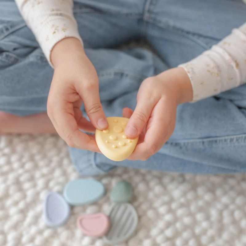Set of 6 Worry Stones for kids — calming sensory fidget toys made from soft, food-grade silicone for mindfulness, anxiety relief, and emotional regulation.