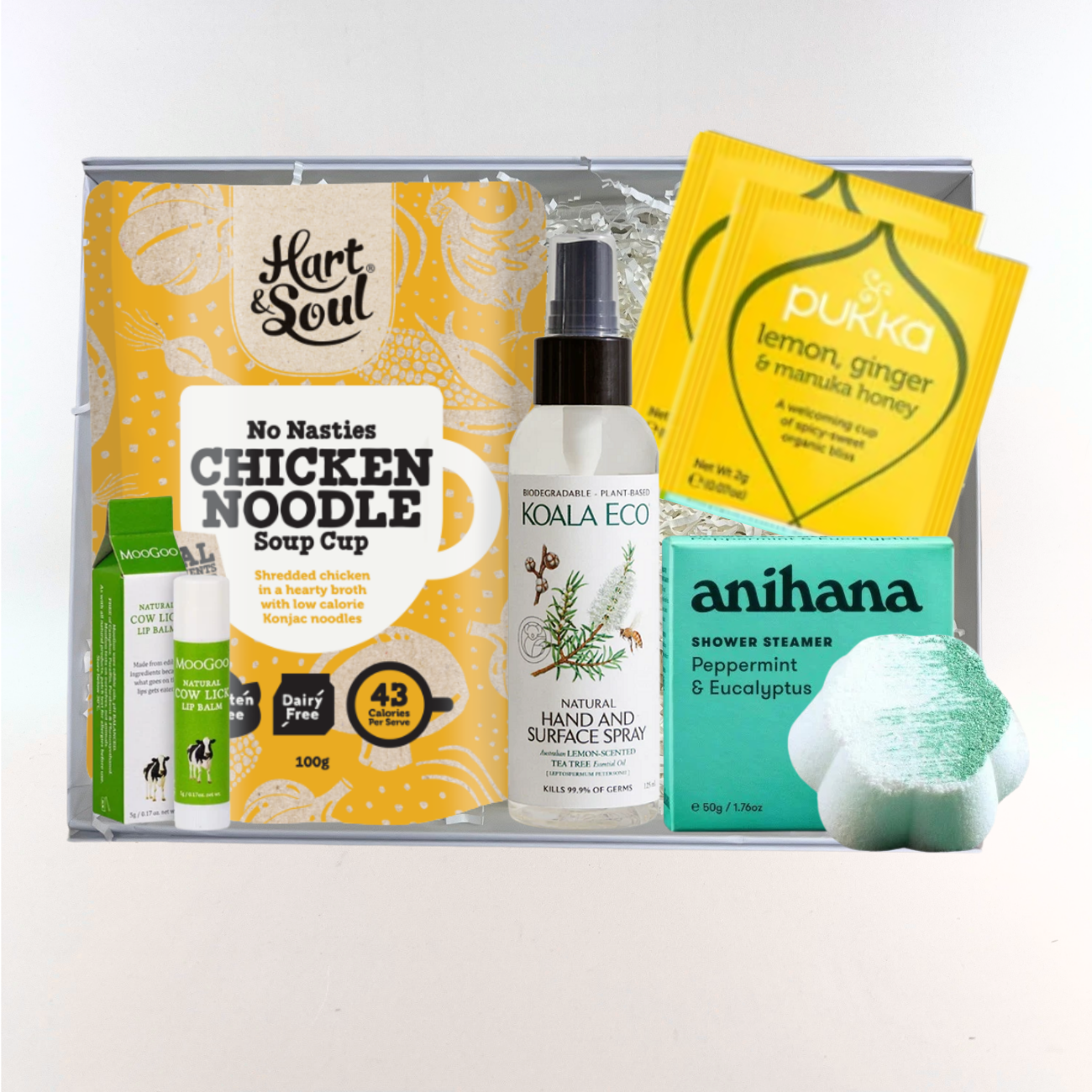 Chicken Soup for the Soul care package featuring Hart & Soul chicken noodle soup cup, Koala Eco and anihana wellness products, presented in a Wishing You Well gift box.