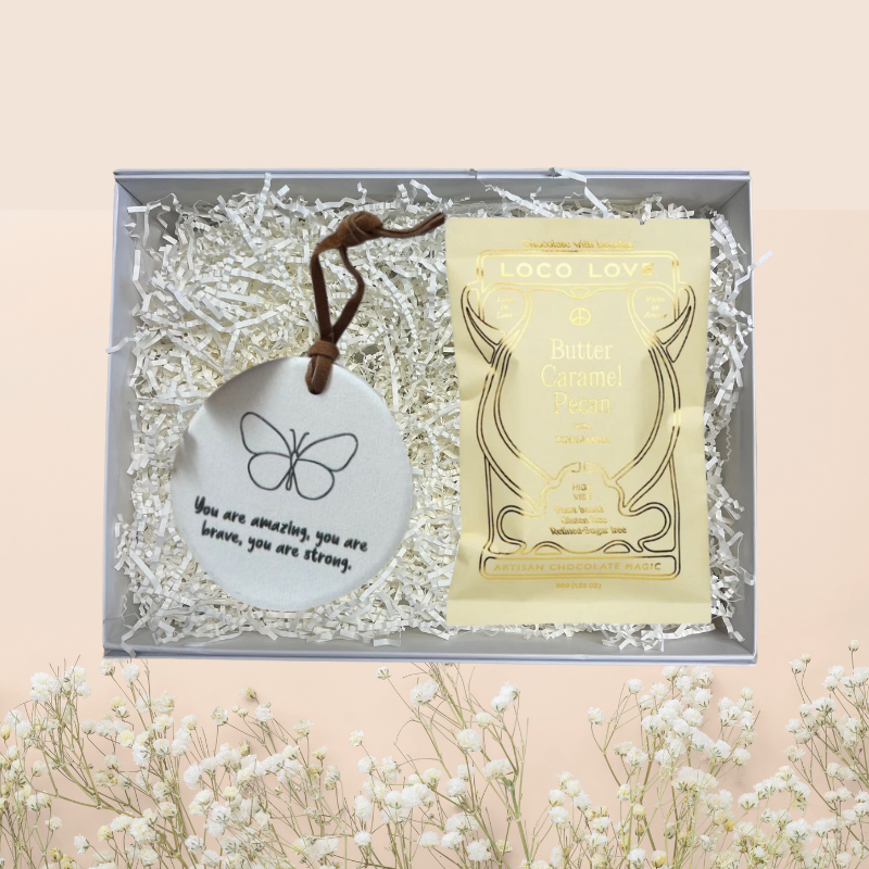 A Little Joy Gift Box with Loco Love butter caramel pecan chocolate bar and delicate inspirational ceramic trinket in a signature gift box with grosgrain ribbon