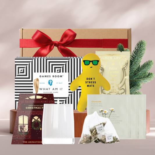 Unwrap and Unwind Christmas gift box with Smith and Co candle, Love Tea, Loco Love chocolate, What Am I card game and stress squishie
