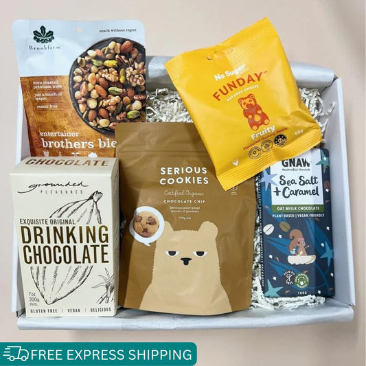 vegan snack gift box. Includes serious cookies, trail mix, drinking chocolate, funday gummies
