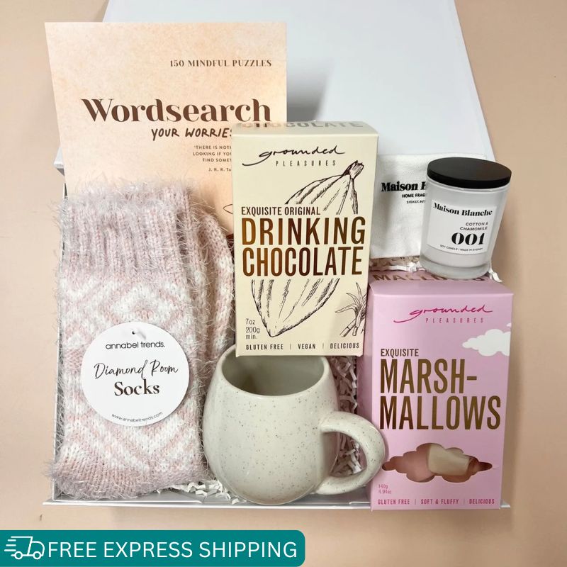 Virtual hug care package. warm socks, mug, drinking chocolate & marshmallows, mini candle and wordsearch.